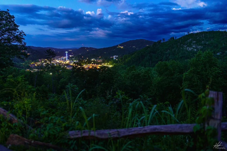 Town lights in a mountain valley at blue hour